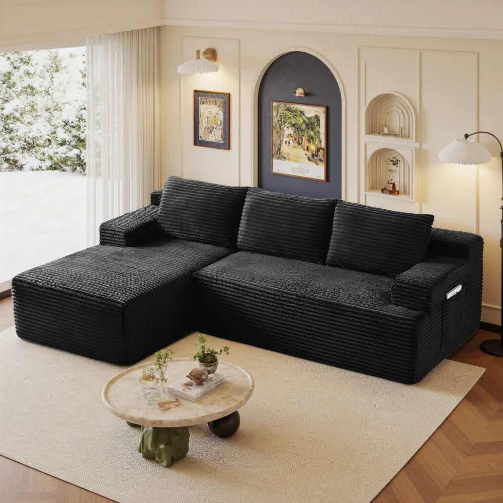Black corduroy L-shaped sectional sofa with chaise