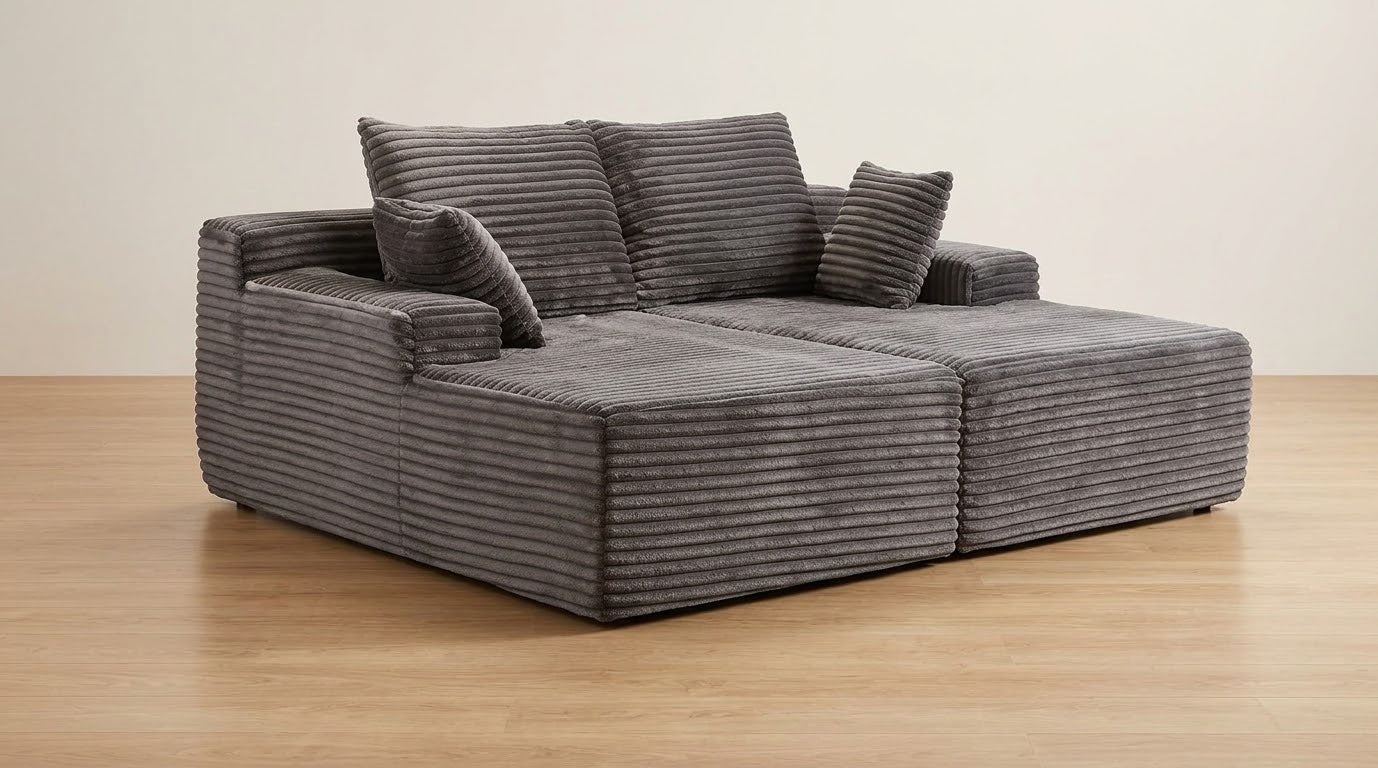 Dark grey modular corduroy sofa in corner configuration