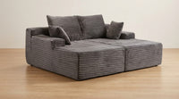 Dark grey modular corduroy sofa in corner configuration