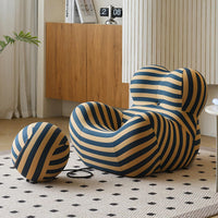 Blue modern floor sofa chair with round ottoman